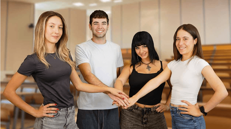four-students-hands